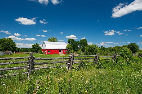 Canada-Ontario-Limoges Red barn and wooden fence